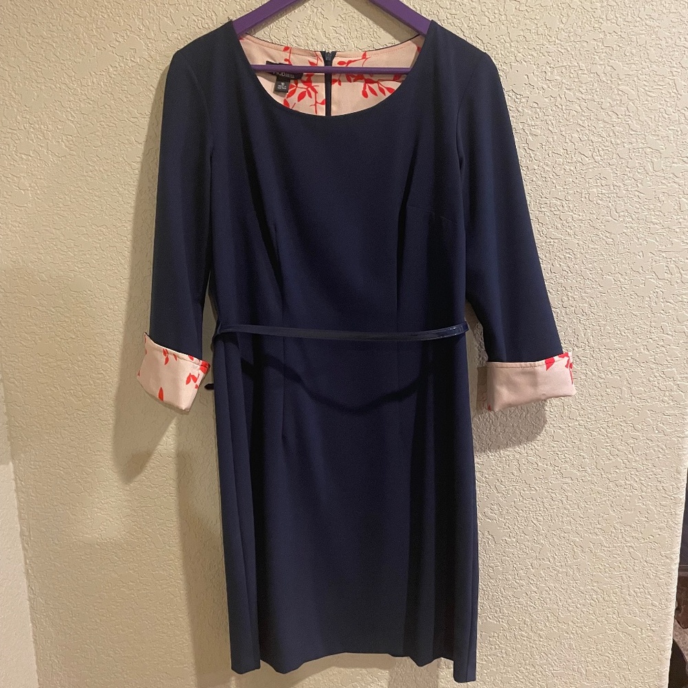 Navy blue dress with floral cuffed sleeves